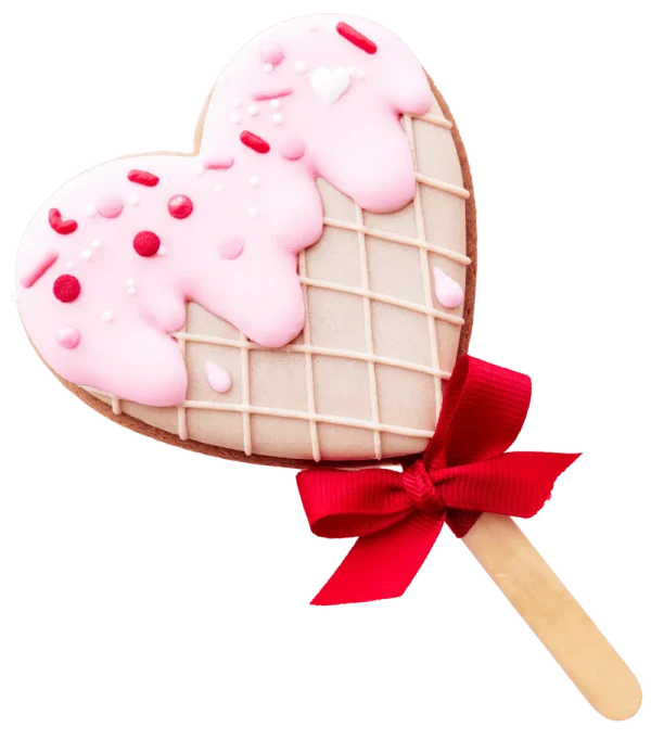 Heart-shaped cake pop with pink frosting and sprinkles