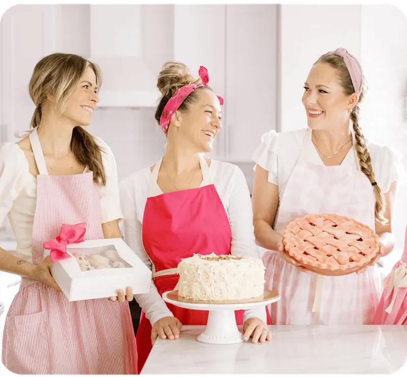 Austin home bakers in a kitchen with custom cakes and pies